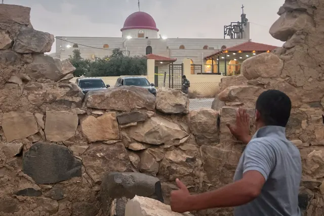 Gunmen open fire at a church during a funeral in Jordan, killing 7 and wounding 40